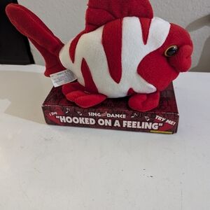 Red and White Singing Fish Plush Toy